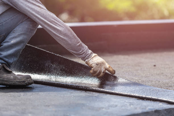 Professional Basement Waterproofing technician working in Hamburg, NY